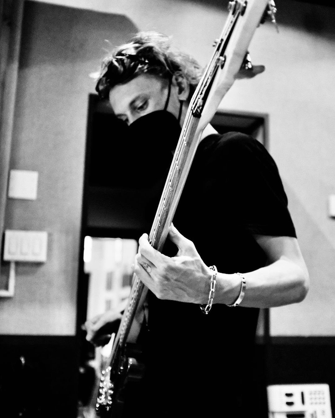 Jamie Bower with a guitar