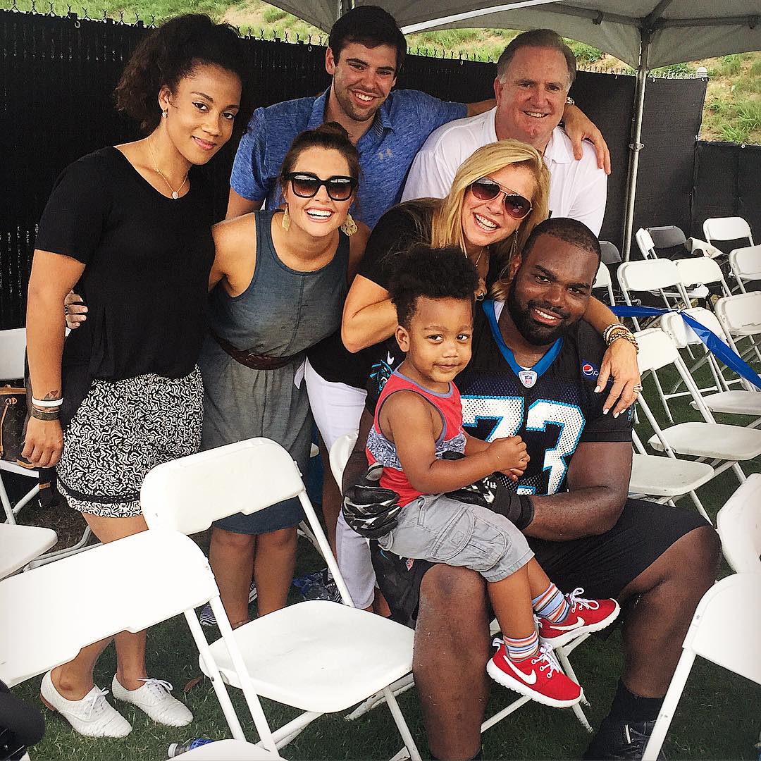 Michael Oher with his family and wife