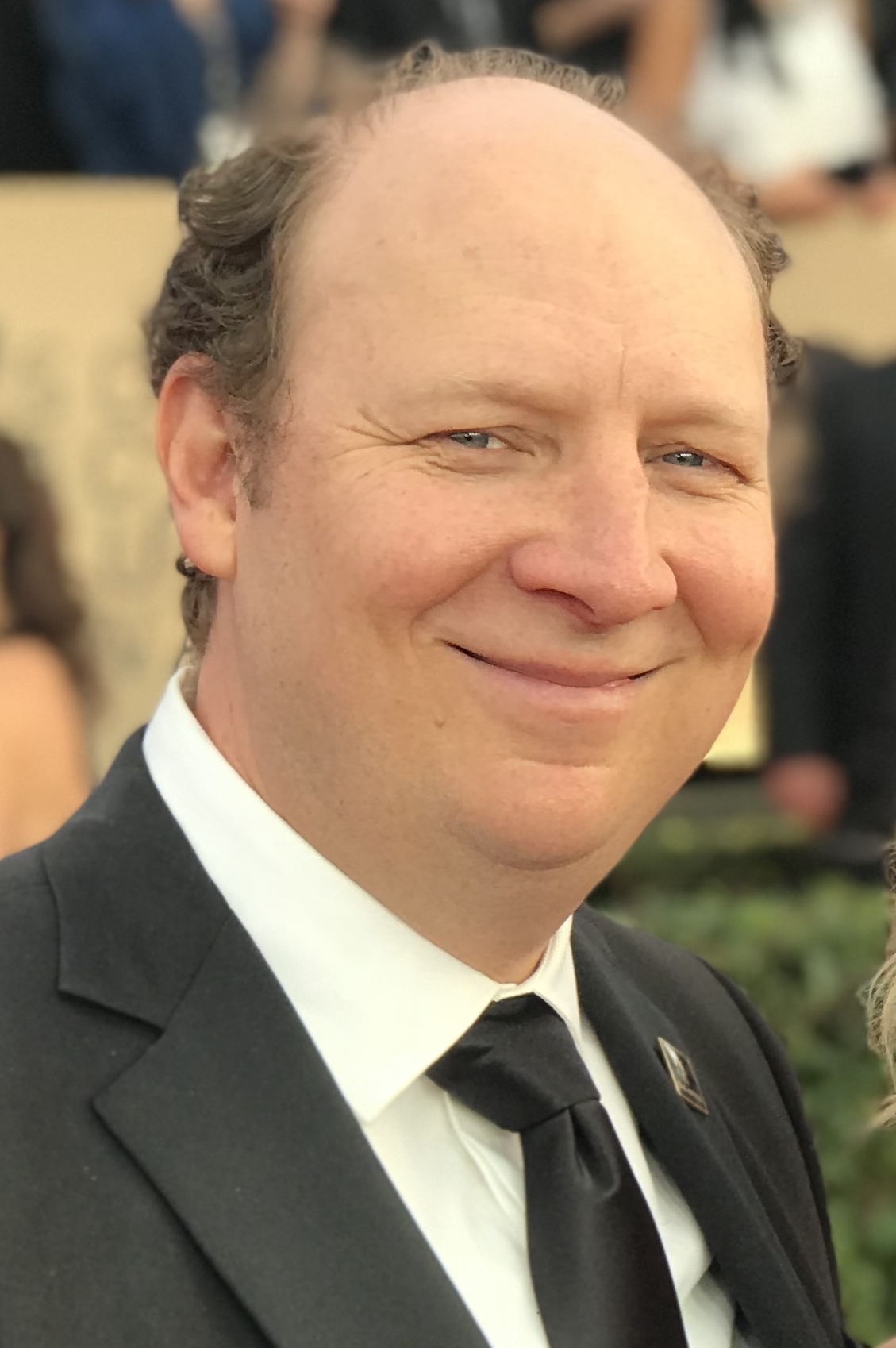 Dan Bakkedahl is an American actor and improvisational comedian. He is best known for starring as Tim Hughes on the CBS sitcom Life in Pieces, as Congressman Roger Furlong on the HBO series Veep, and as Steve Nugent in the FX comedy series Legit.