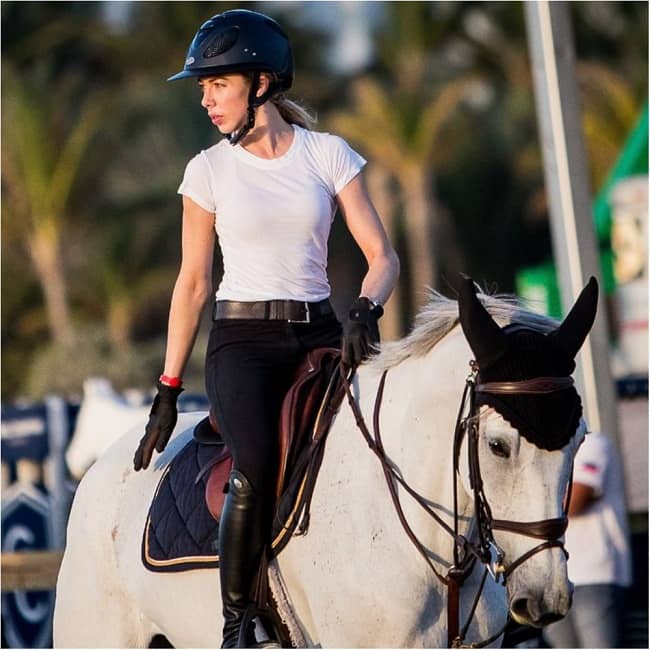 Hannah Margaret Selleck riding a white horse