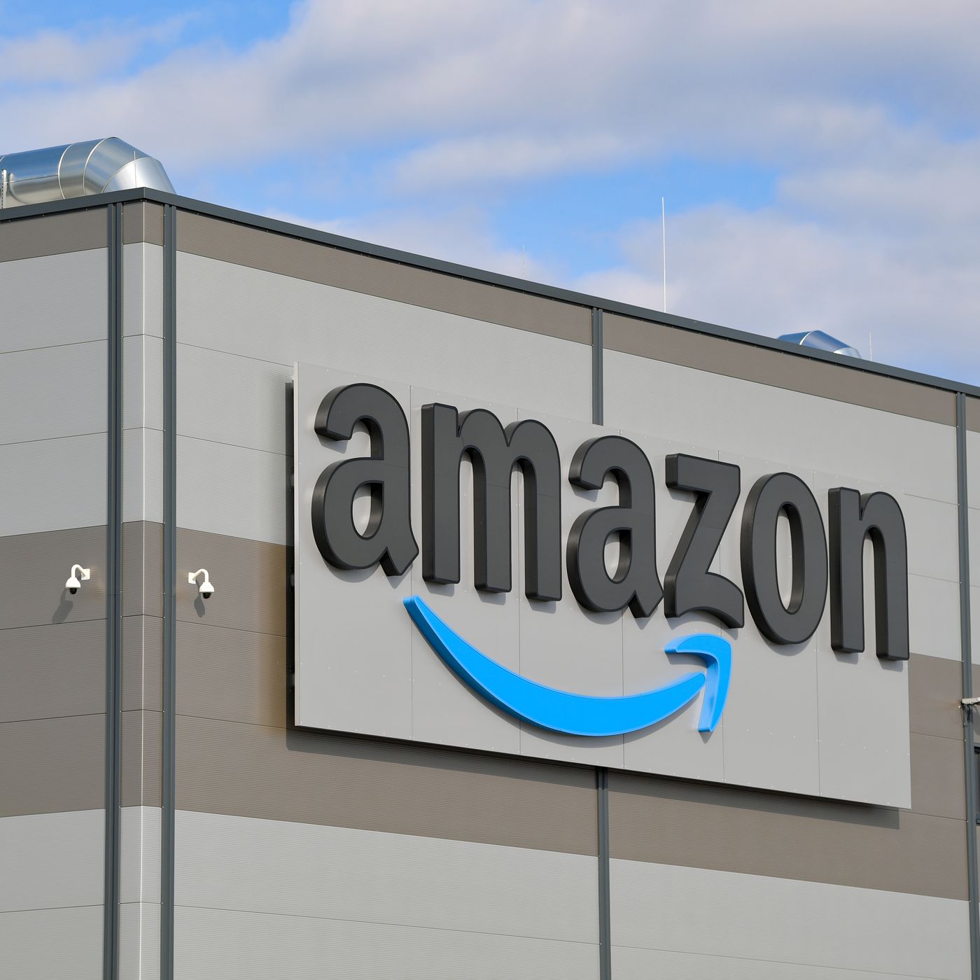 Amazon logo with the big blue arrow