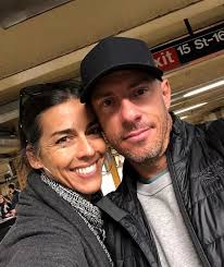 Tina caspary's selfie with husband with both wearing black jackets