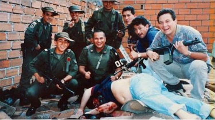 Pablo Escobar dead on the spot on a roof where he was shot dead by the Colombian police