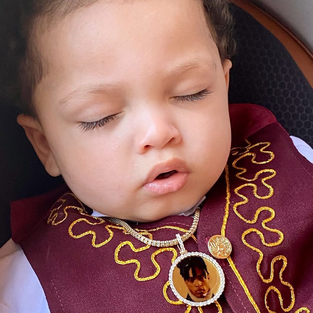 Gekyume Onfroy sleeps in birthday mariachi attire wearing a diamond-encrusted photo pendant with XXXTentacion’s picture