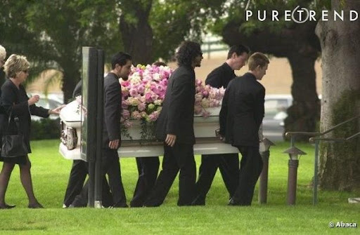 Jennifer syme coffin being carried by men at her funeral