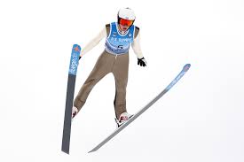 Ski jumper in mid-flight