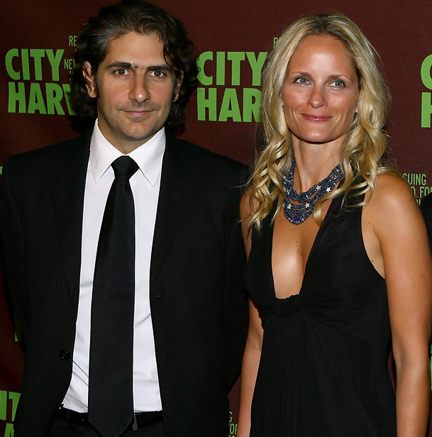Heather deForest Crosby, standing beside a man, attends the 14th Annual City Harvest Practical Magic Ball in New York