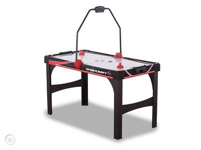 Sportcraft 54″ Excelerator Turbo Hockey Table designed with black and red color and has a red puck in the table