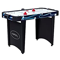 An air hockey table with blue graphics laminated to the surface
