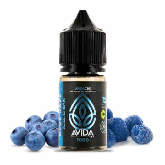 A bottle of blue razz Avida CBD vape juice with balls of blueberries around it