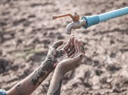 Scarcity is demonstrated by two hands that wait for water from the faucet