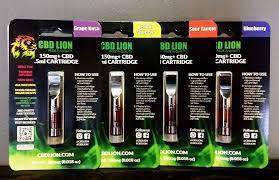 Four packs of CBD Lion vape cartridges in different flavors