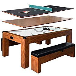 An air hockey table with a furnished wooden body and legs that can be turned into a table tennis and dining table