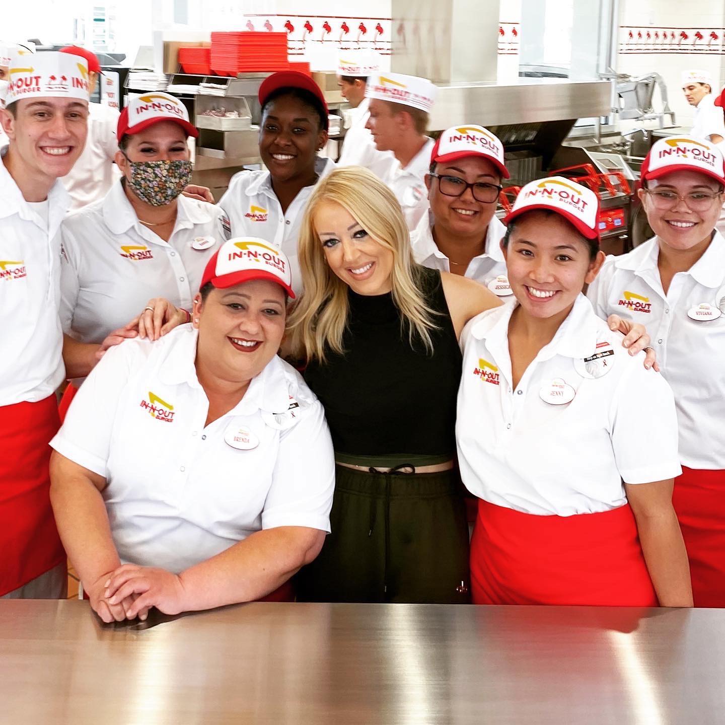 Lynsi Snyder with the In-N-Out Burger crew of Brea branch in California