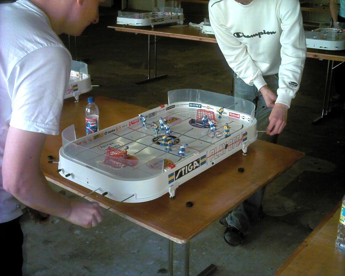 Experience The Arcade With A Rod Hockey Game