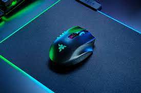 The Razer Viper Ultimate wireless mouse black color and snake Tattoos green light on the side and half side of the keyboard 