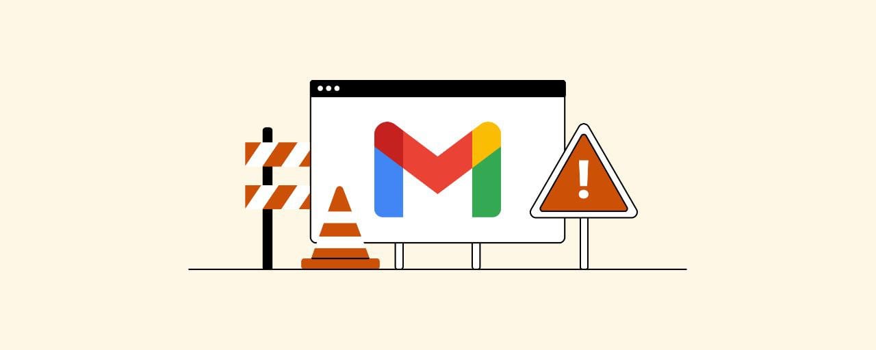 Gmails logo with a warning sign and stop cones