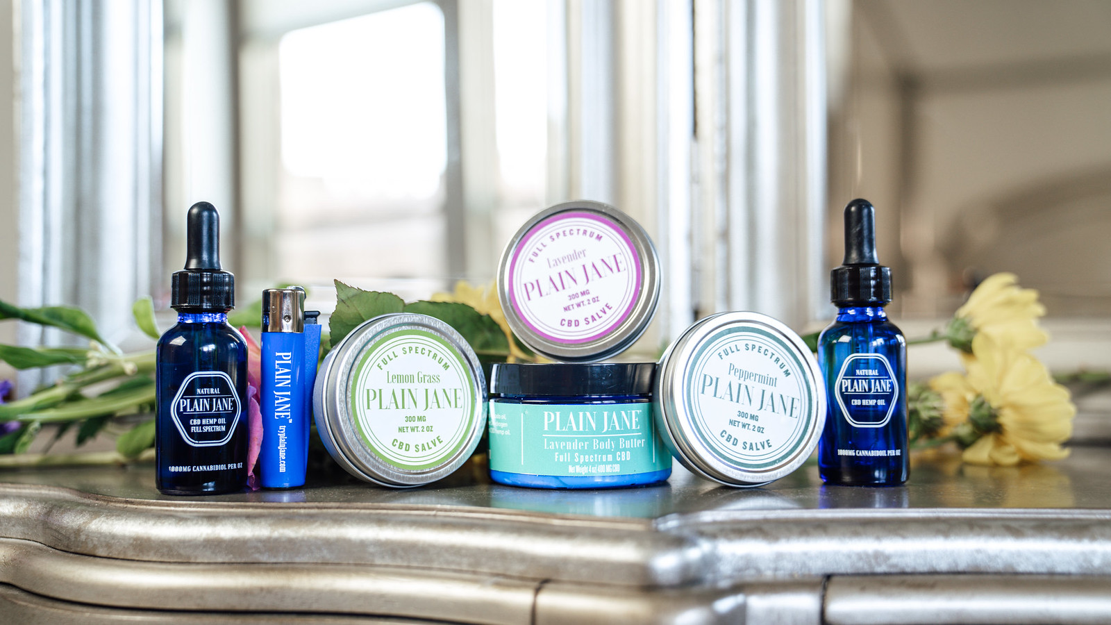 The different products offered by Plain Jane CBD lined up