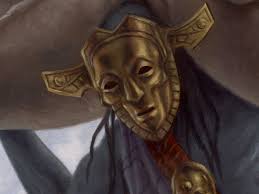 Gray, Merchant Of Asphodel A man in a dark blue dress is seen wearing a golden mask