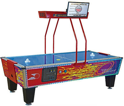 The Gold Standard Games Gold Flare Elite Hockey Table has a flare like designed, blue playing field, and scoring system positioned above the playing table