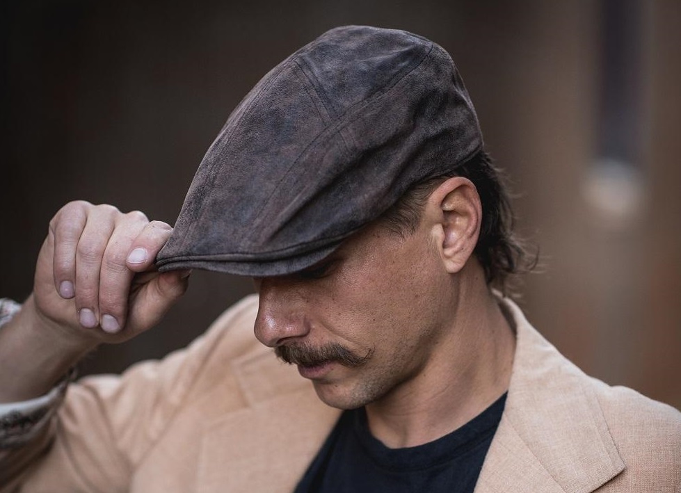 A man wearing a cap