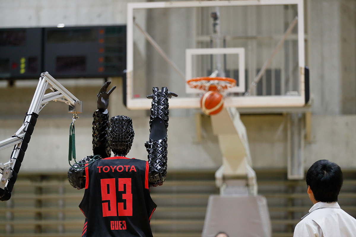Basketball player robot toyota backside in the stadium