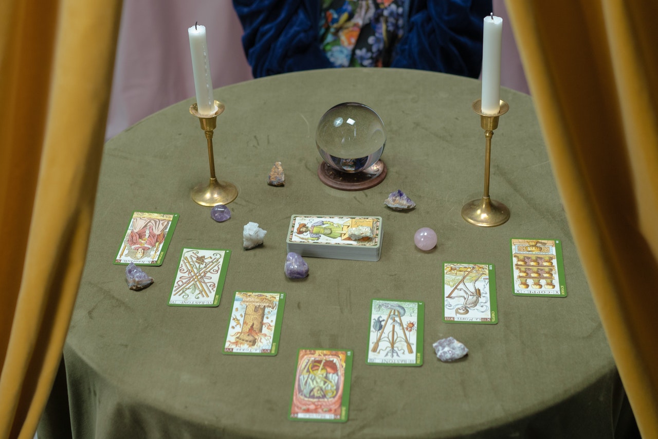 Tarot Cards and a Crystal Ball on the Table