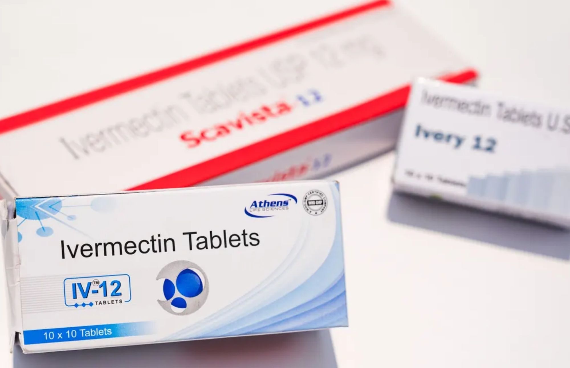 Three boxes of Ivermectin Tablets under the white surface