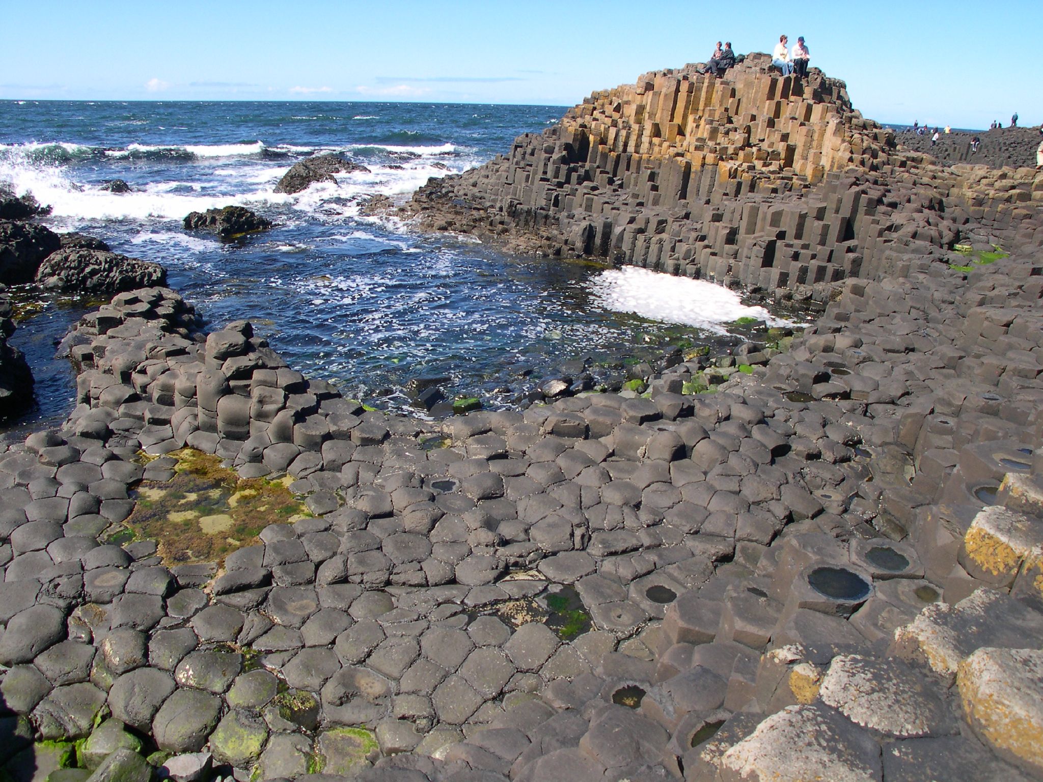 Some tourists visiting the Giant’s Causeway, Northern Ireland