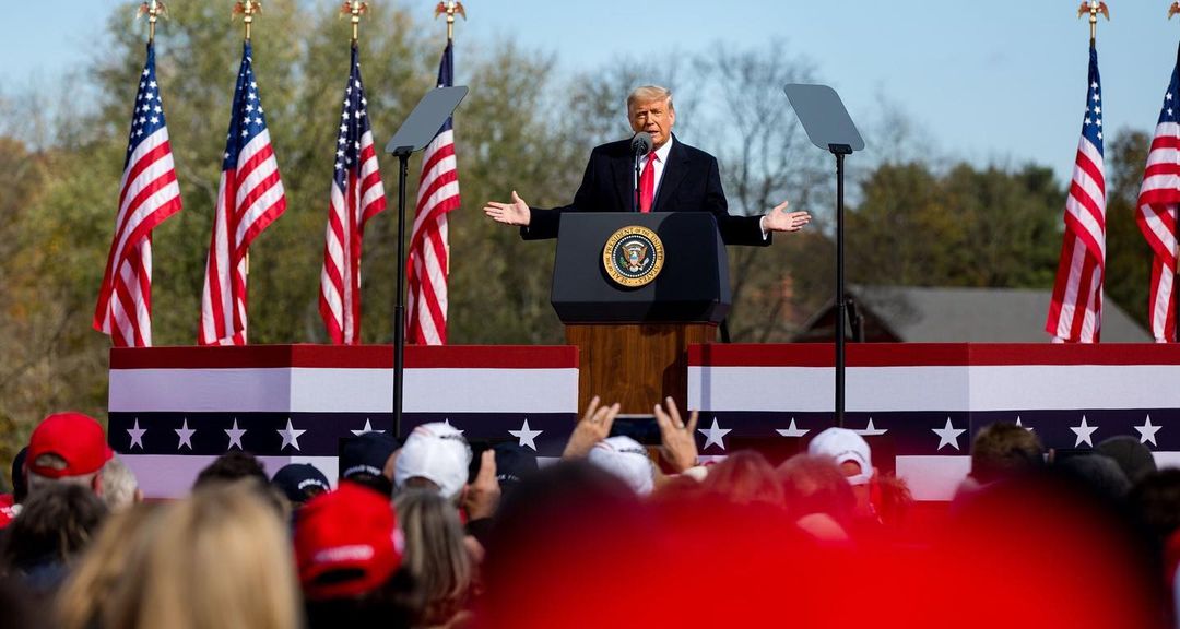 U.S. President Donald Trump giving a public speech outdoors