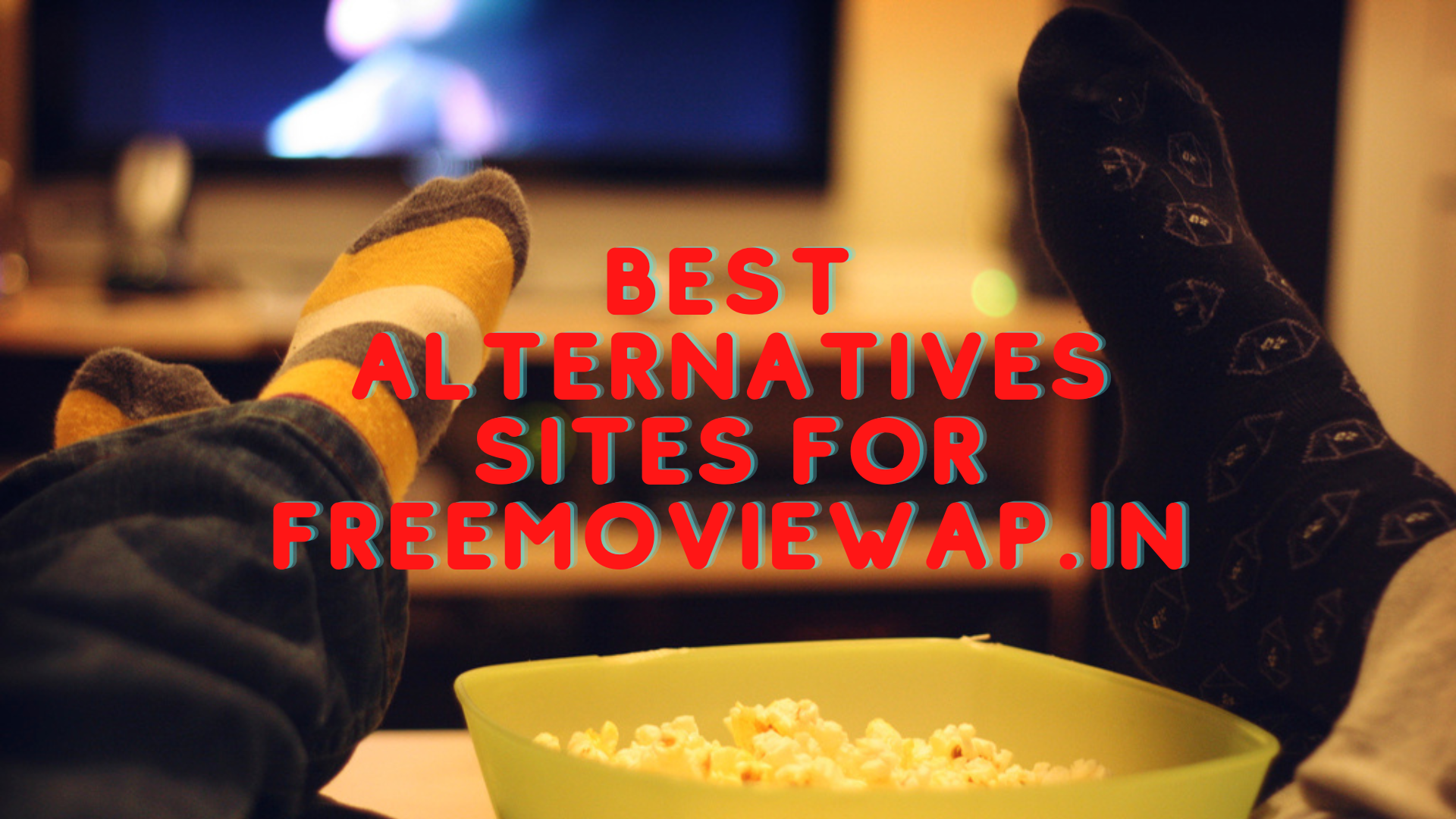 Two feets on the table with a bowl of popcorn and words Best Alternatives Sites For Freemoviewap.in