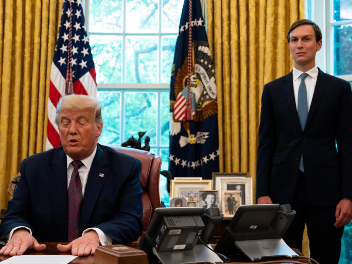 Inside the President's office, US President Donald Trump is looking down on his table, while Jared Kushner stands by his side