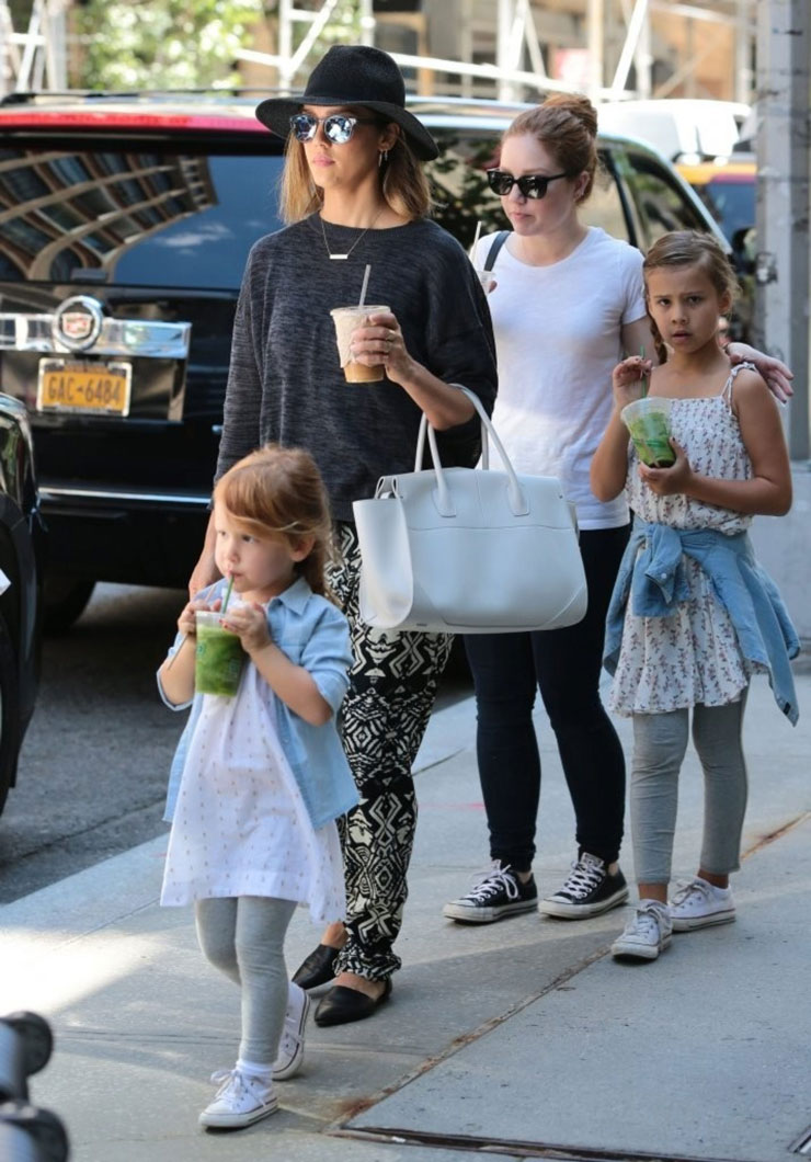 Jessica Ditzel with her kids walking on the street