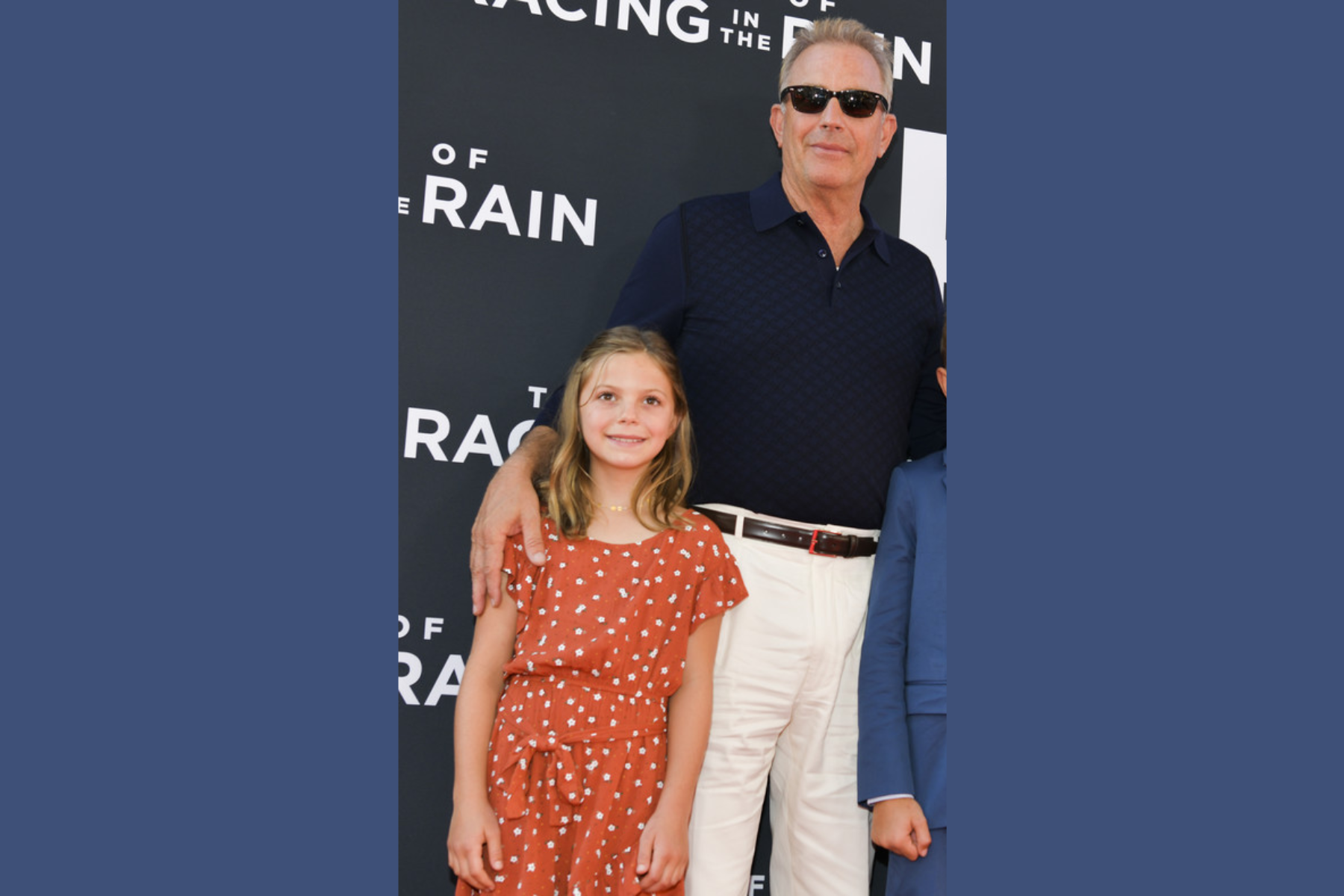 Grace Costner poses for a photo with his father by her side at an event