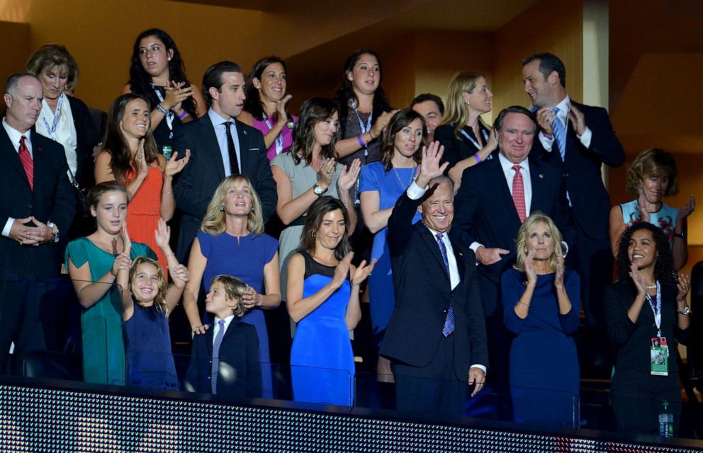 Joe Biden with his family standing in an event