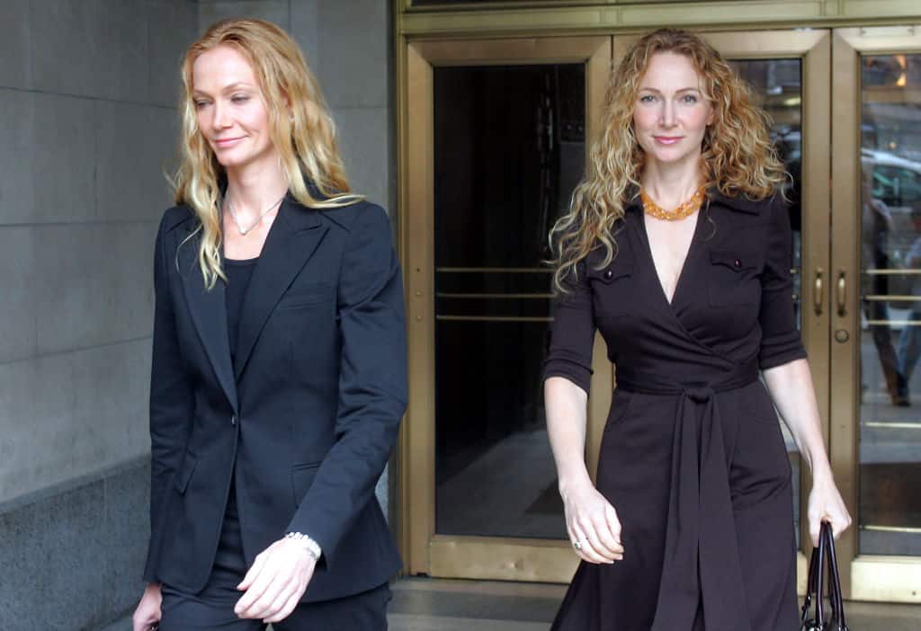 Jean Muggli on the right wearing black dress and her lawyer on the left