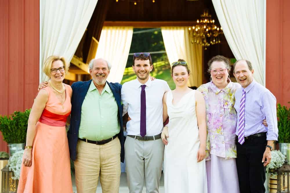 Dr. Deborah and her husband Paige Reffe on the far left posing for a picture during his son's wedding