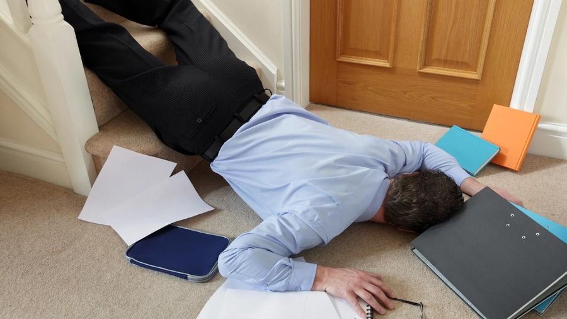 An Office Man Fall From Stairs With Files