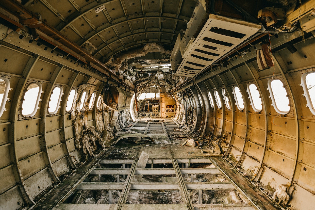 Interior of crashed aircraft cabin with windows