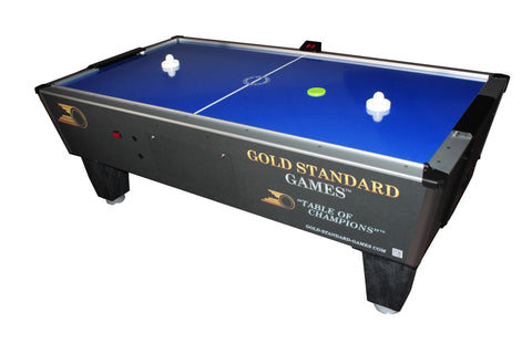 The Gold Standard Games Home Pro Elite Air Hockey Table has a blue playing surface and white pair of pushers