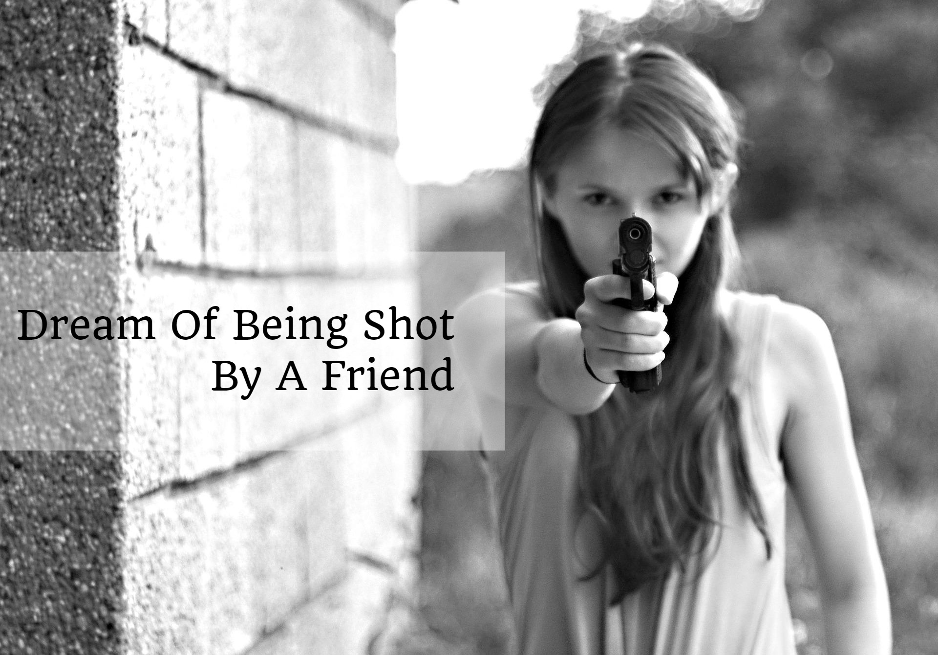A girl holding a gun and pointing it directly at the camera
