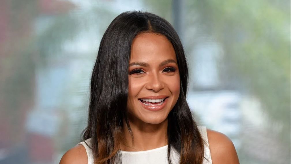 Christina Milian with a big smile on her face