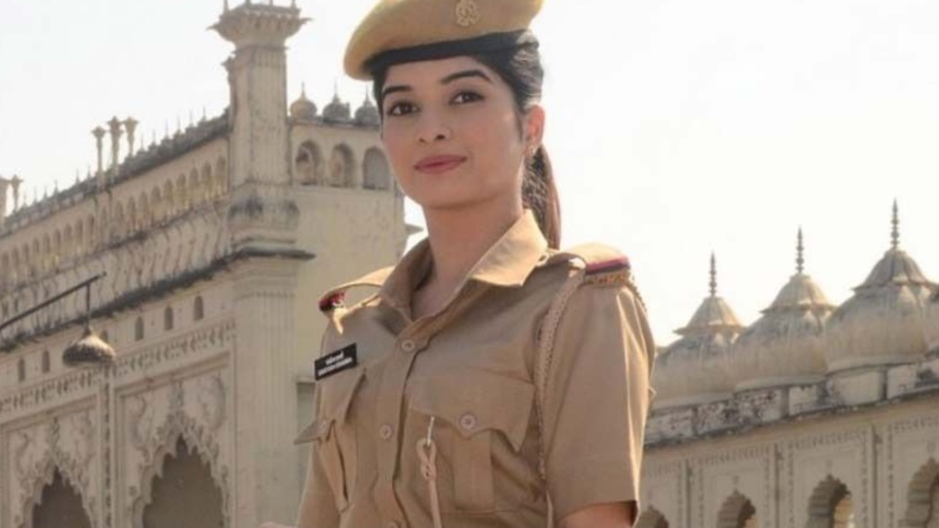 Bhavika Sharma In Police Uniform In Front Of Historical Buildings