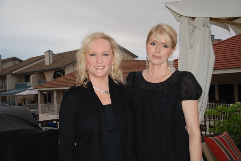 Kim Woolery with a friend all dress in black