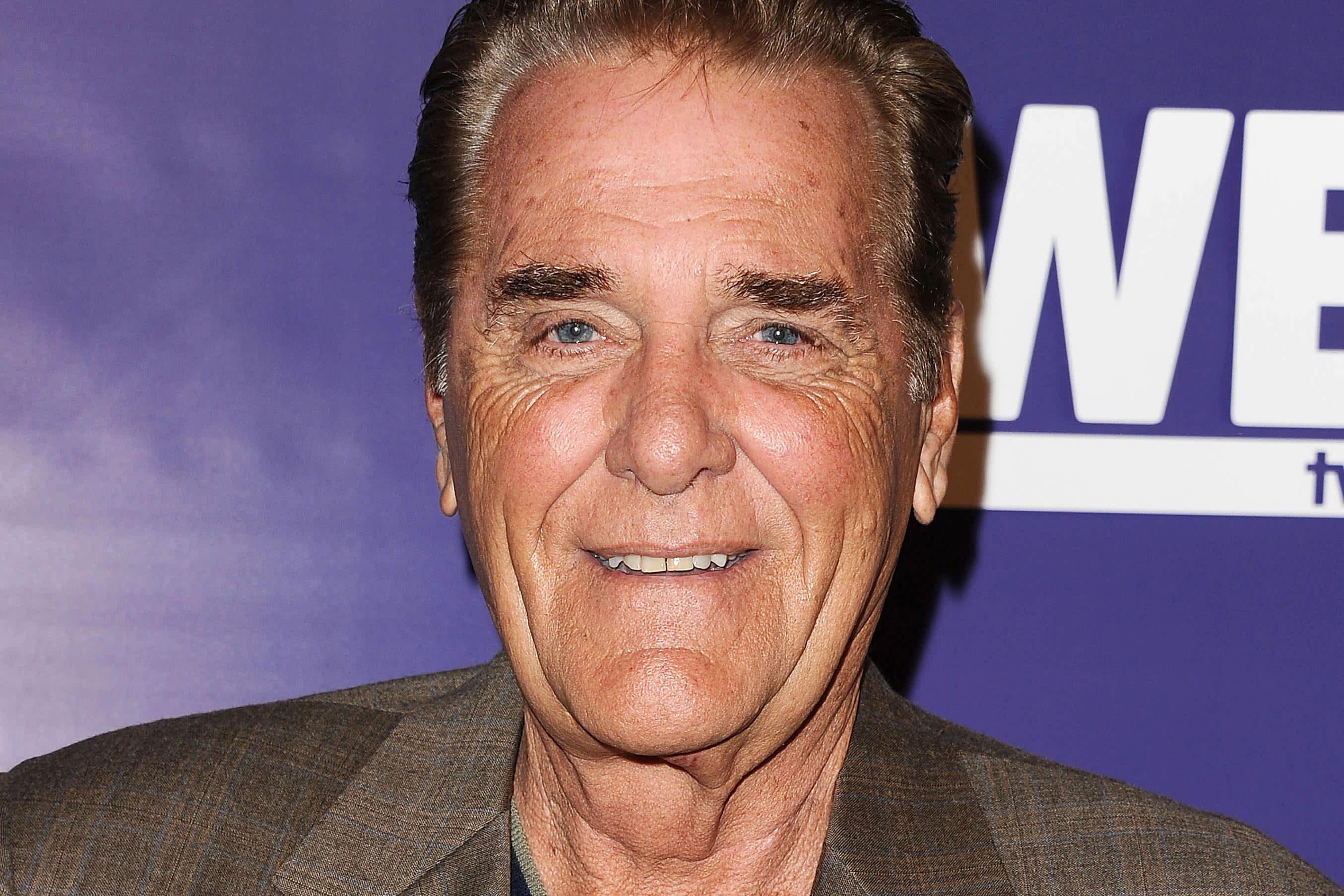 Kim Woolery's husband Chuck Woolery at an event