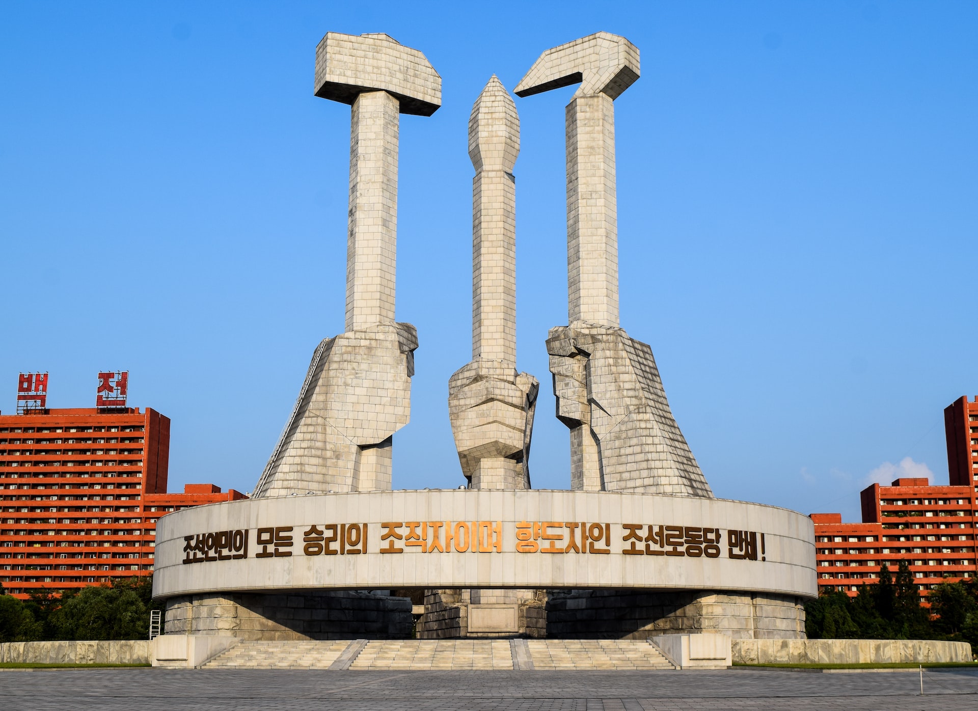 North Korea’s Monument to Party Founding showing a massive granite hammer, sickle and calligraphy brush in Pyongyang