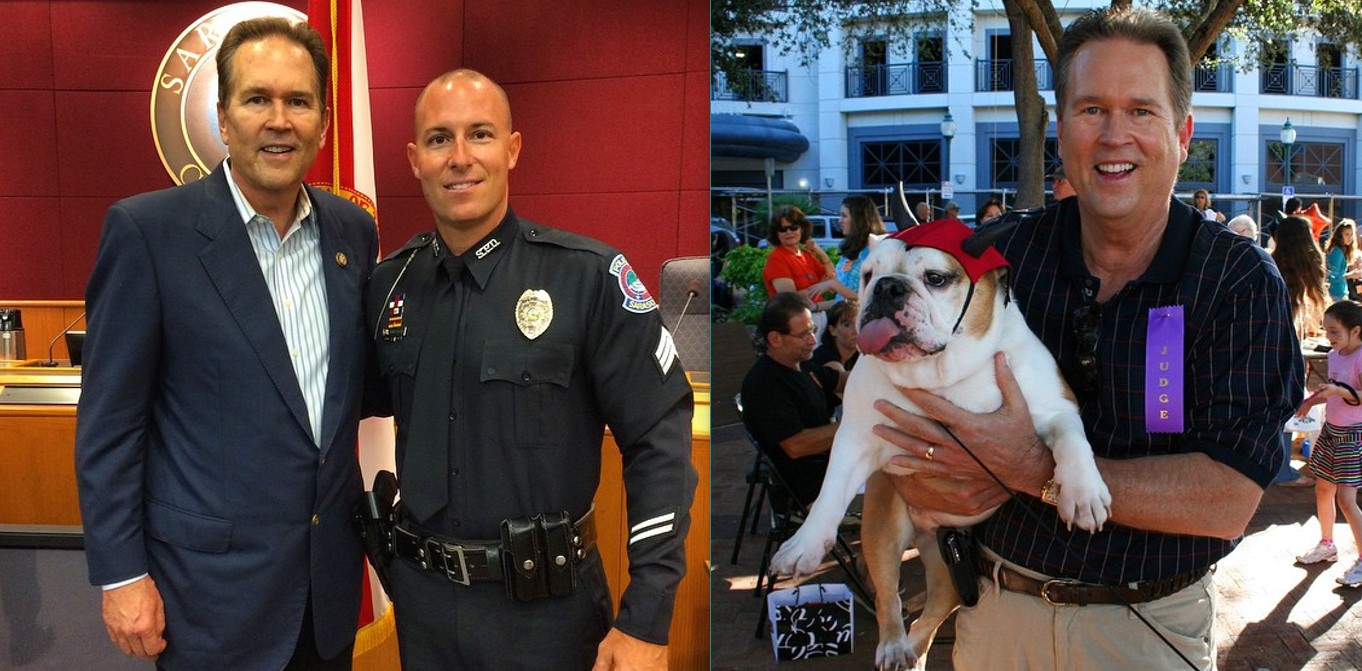 Vern Buchanan standing beside a male police officer; Vern Buchanan holding a bulldog