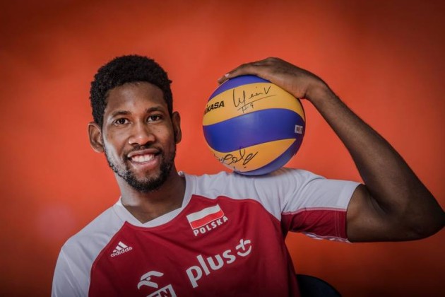 Wilfredo Leon holding a volleyball