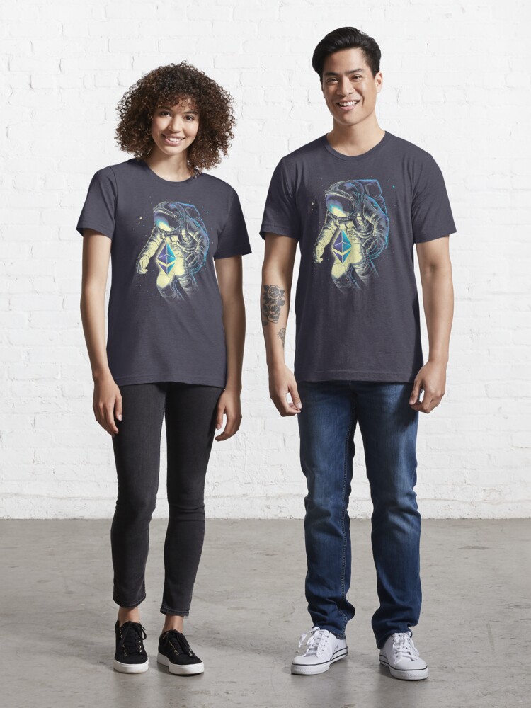 A man and a woman wearing Space Ethereum shirts