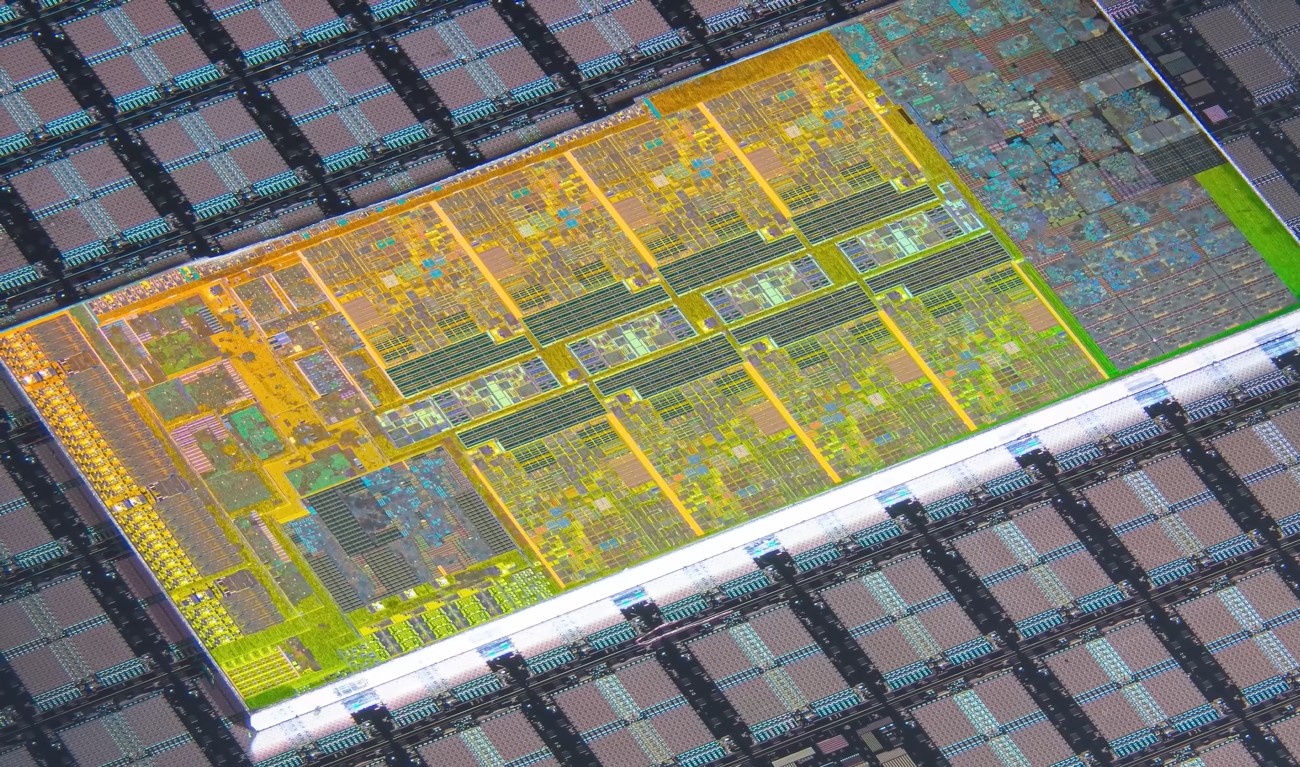 A magnified 7nm chip, showing colors mostly yellow and yellow-green ones
